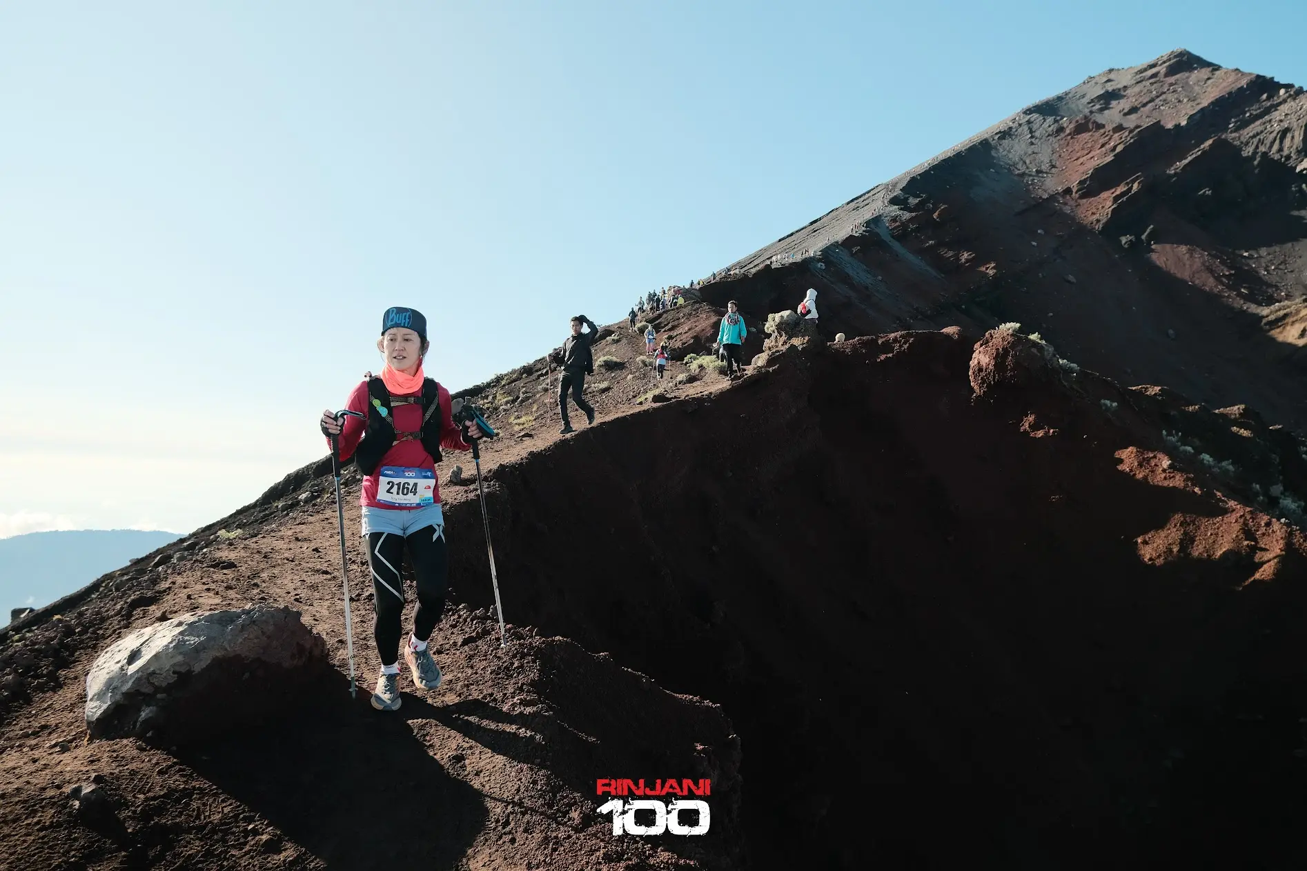Trail runners descending from Mount Rinjani terrain in Lombok